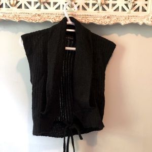 Knit black cropped sweater.